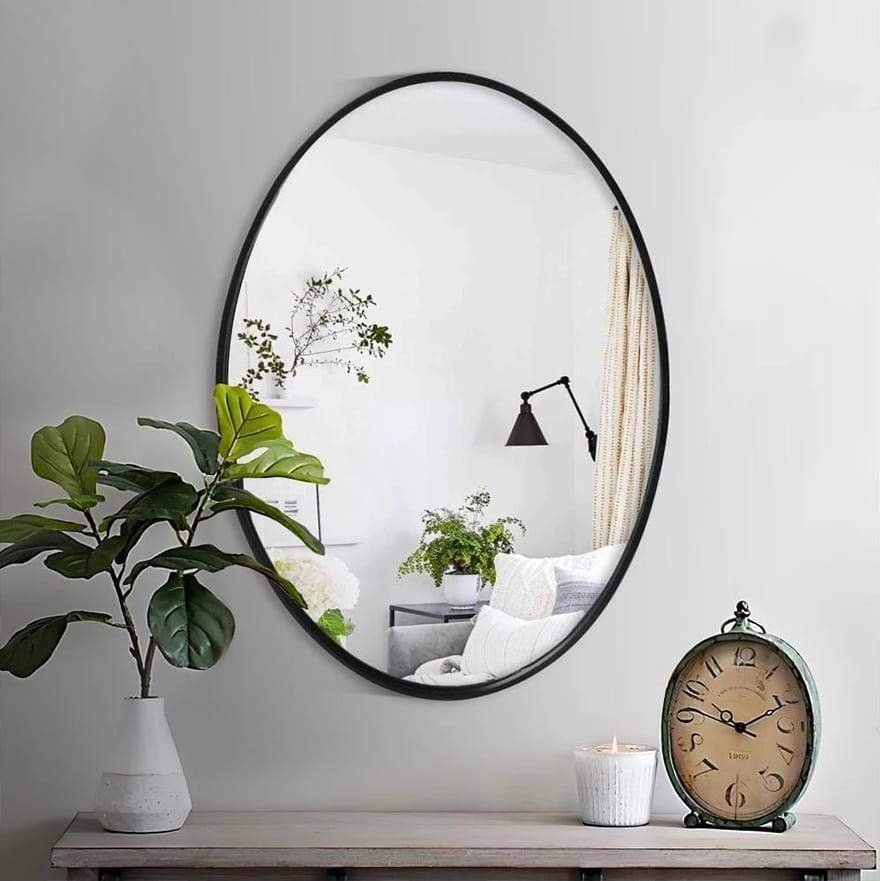 Oval Metal Wall Mirror with Framed Edges