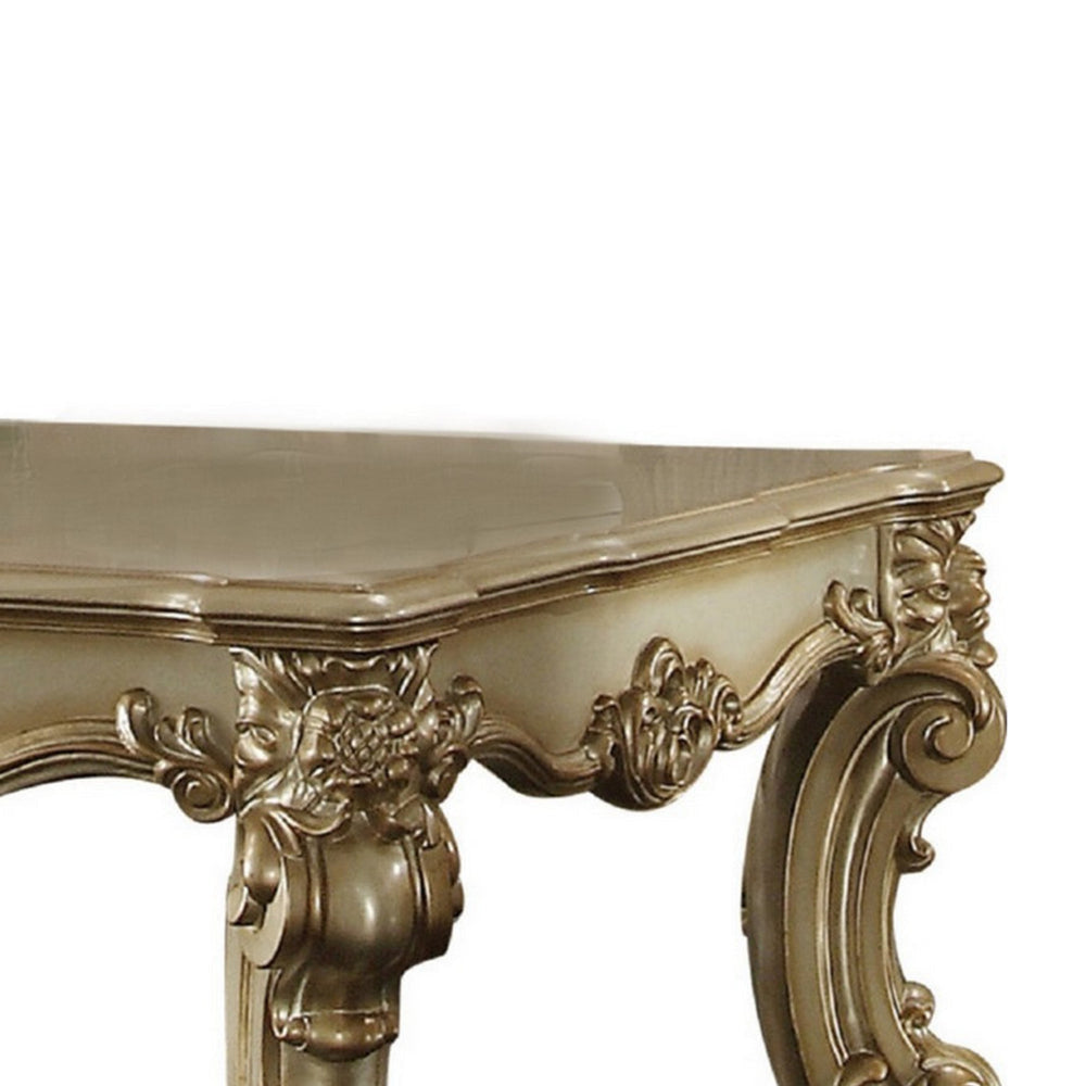 Polyresin Coated Wooden Coffee Table with Engraved Details Gold By Casagear Home AMF-83120