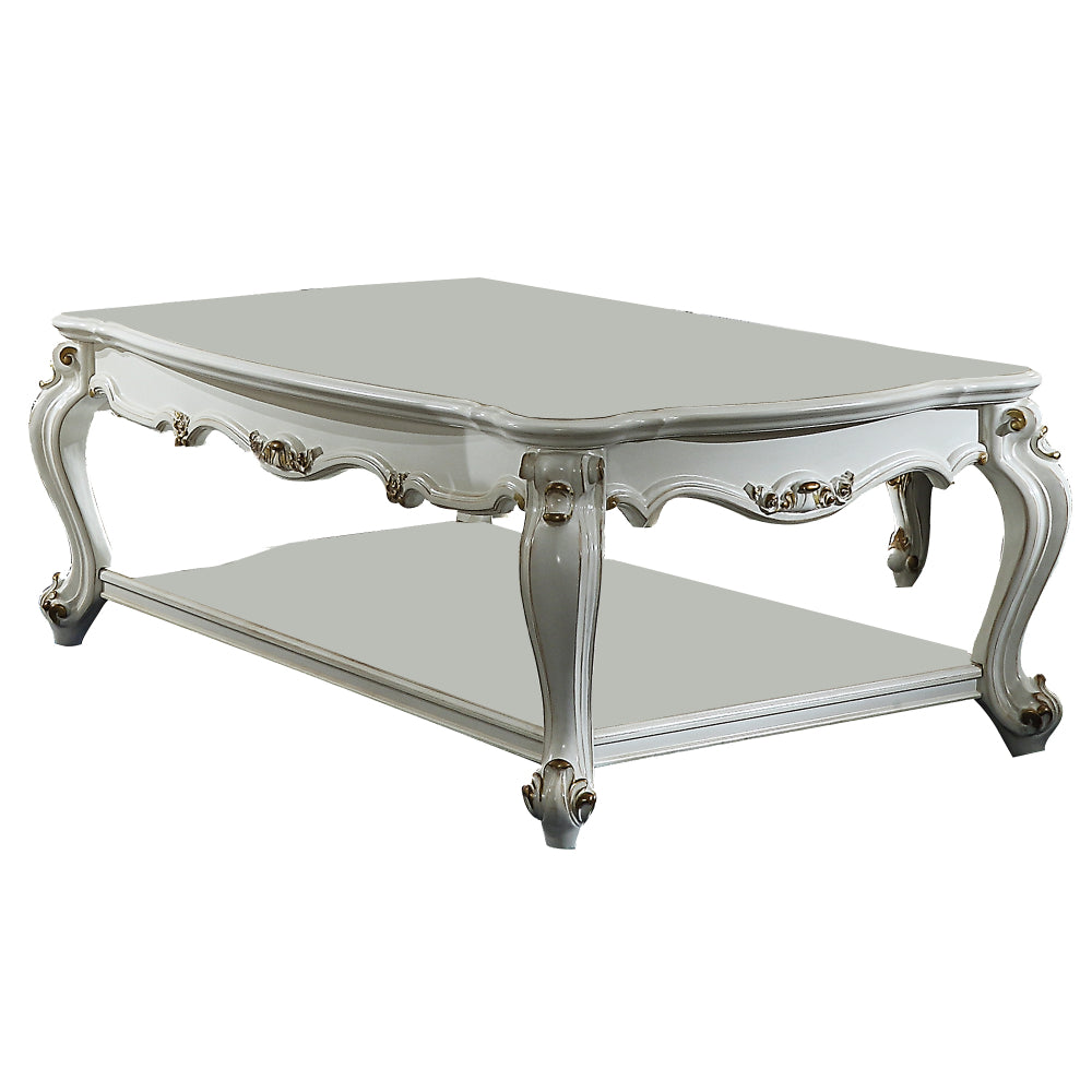 Traditional Style Wooden Coffee Table with Polyresin Carvings and Bottom Shelf White By Casagear Home AMF-83460