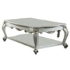 Traditional Style Wooden Coffee Table with Polyresin Carvings and Bottom Shelf White By Casagear Home AMF-83460