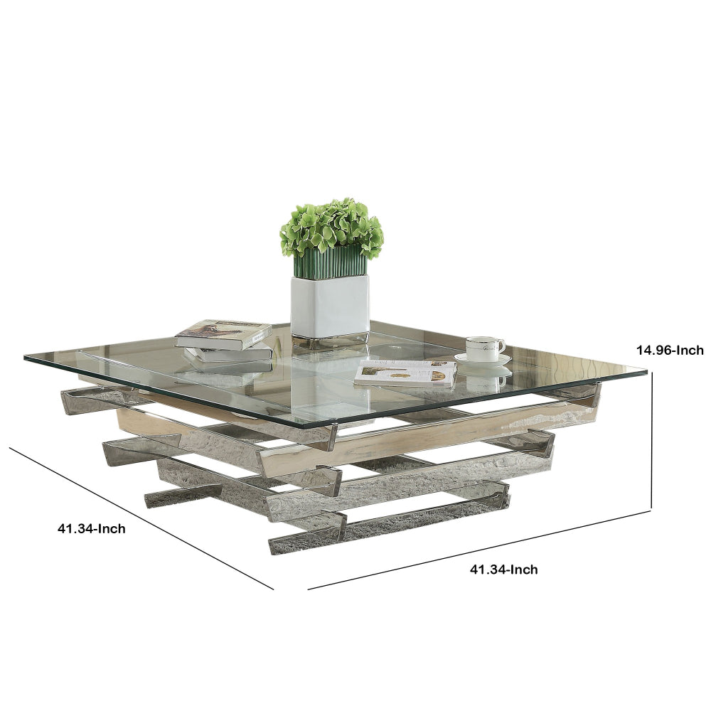 Glass Top Coffee Table with Asymmetrical Metal Base Silver and Clear By Casagear Home AMF-84610