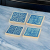 Square Shaped Ceramic Coaster with Intricate Detail, Blue and Cream, Set of Four By Casagear Home