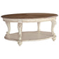 Two Tone Oval Cocktail Table with Bottom Shelf, Antique White and Brown By Casagear Home