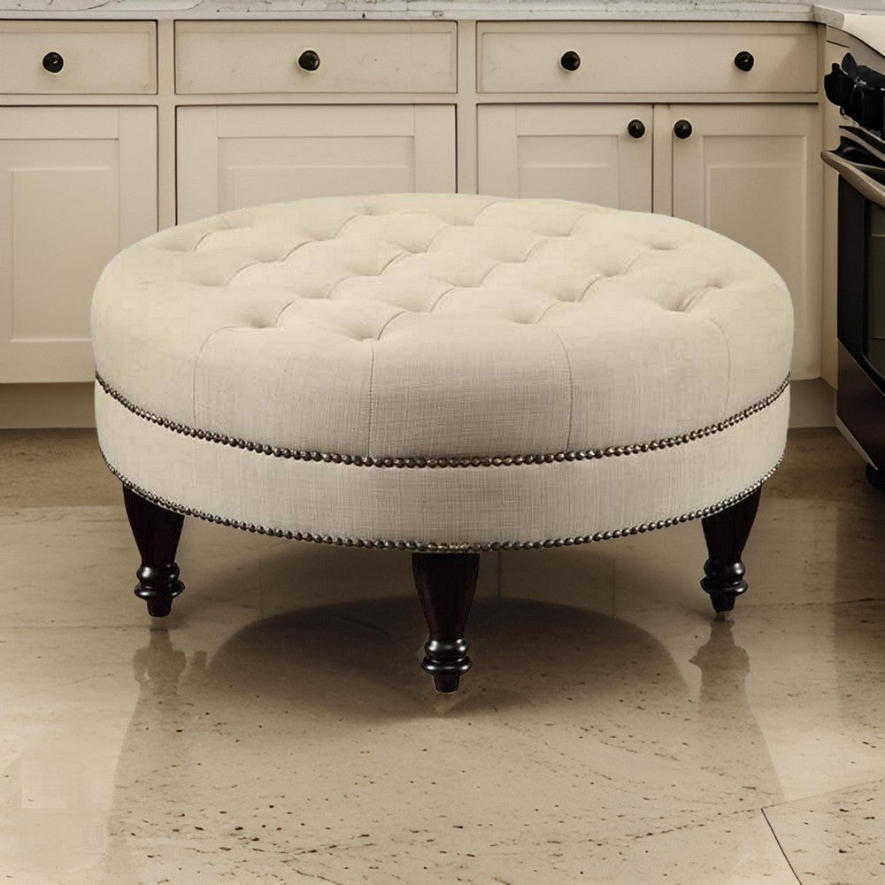 Round Shaped Fabric Ottoman with Nailhead Trim, Gray By Casagear Home