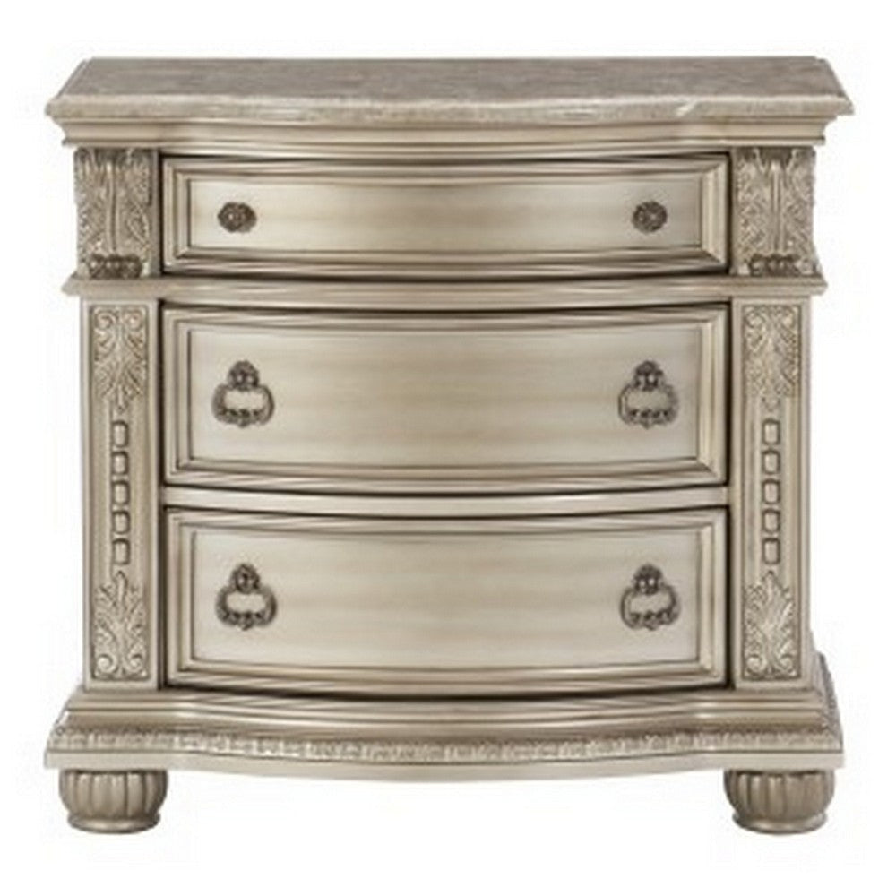 Caitlin 35 Inch 3 Drawer Nightstand with Marble Top Leaf Carvings Silver By Casagear Home BM295557