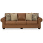 Riana 101 Inch Sofa 4 Accent Pillows Caramel Brown Genuine Leather By Casagear Home BM312056