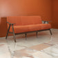 Indy 73 Inch Sofa, Brown Wood Angled Frame, Cozy Textured Orange Fabric By Casagear Home