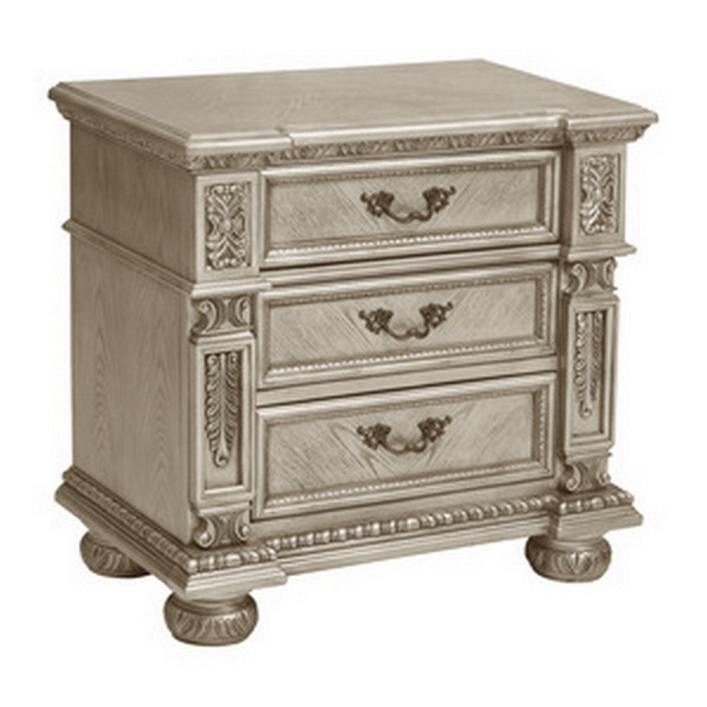 Lumi 31 Inch Nightstand 3 Dovetail Drawers Platinum and Gold Wood Finish By Casagear Home BM314583