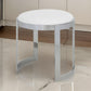 Niyo 19 Inch Accent Stool Ottoman, Round Seat, White Faux Leather, Silver By Casagear Home