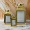 Davi Set of 3 Decorative Lanterns Curved Handles Glass Panel Brass Metal By Casagear Home BM315626