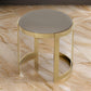 Niyo 19 Inch Ottoman Stool Round Sand Faux Leather Stainless Steel Gold By Casagear Home BM317113