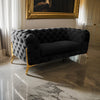 Reno Joni 74 Inch Loveseat Tufted Black Velvet Metal Legs in Gold Finish By Casagear Home BM317638