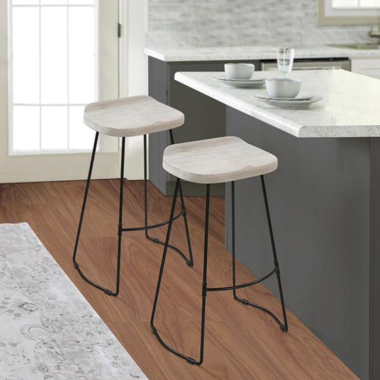 Tiva 30 Inch Handcrafted Backless Barstool, Whitewashed Mango Wood Saddle Seat, Black Metal Base By The Urban Port