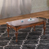 Wooden Coffee Table with Fluted Turned Legs and Carved Design, Brown