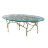 47 Inch Artisanal Coffee Table with Metal Frame, Oval Clear Glass Top, Gold By Casagear Home