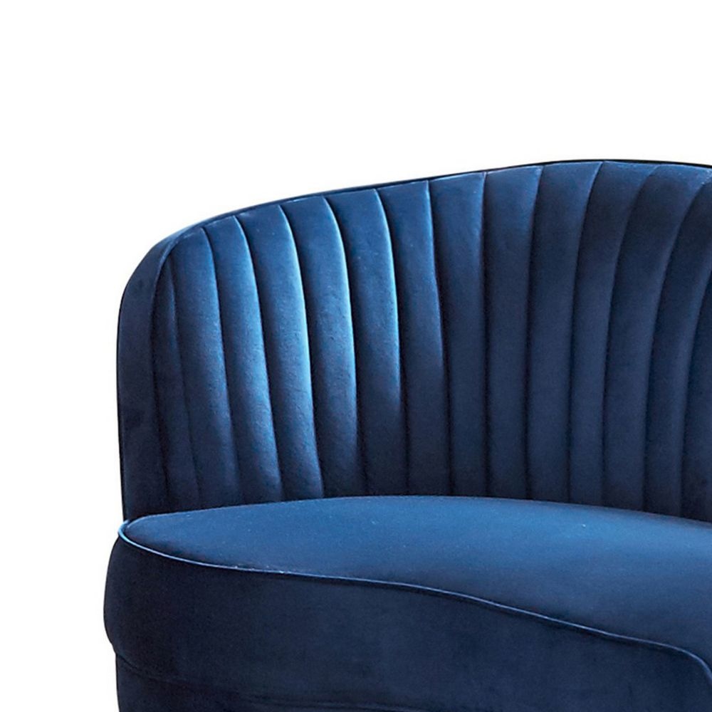 Chad 74 Inch Curved Loveseat Channel Tufting and Camelback Blue Velvet By Casagear Home BM295074