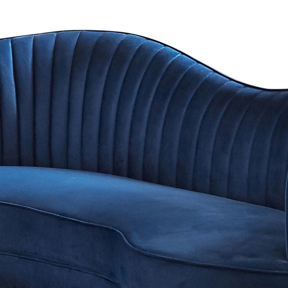 Chad 74 Inch Curved Loveseat Channel Tufting and Camelback Blue Velvet By Casagear Home BM295074