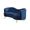 Chad 74 Inch Curved Loveseat, Channel Tufting and Camelback, Blue Velvet By Casagear Home