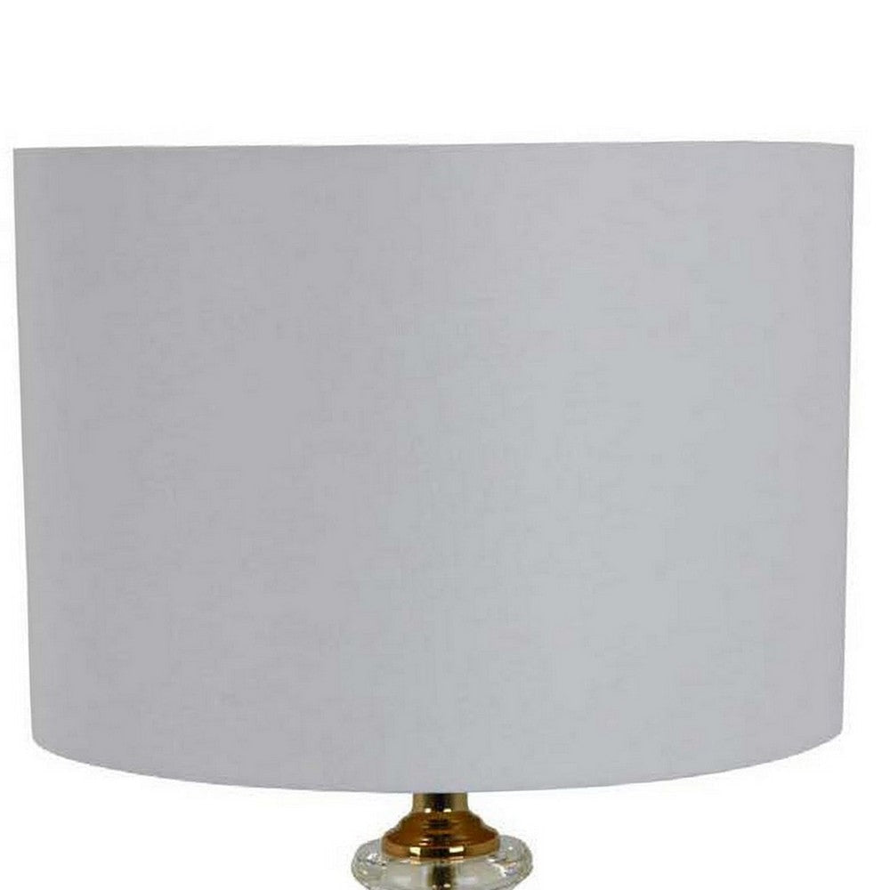 22 Inch Table Lamp Modern Clear Glass Turned Body Classic Gold Accents By Casagear Home BM309804